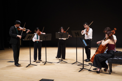 Chamber group performing on stage