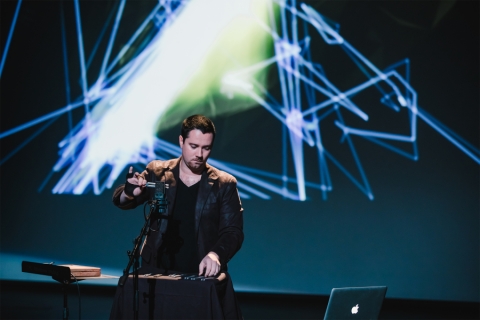 Multimedia artist during a music event
