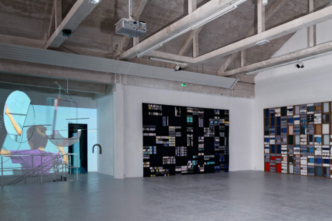 Installation view of sculptures and video