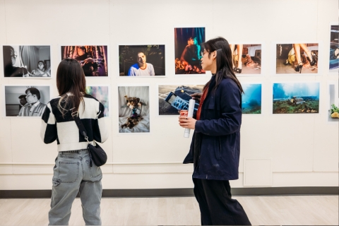 Patrons viewing art in a gallery
